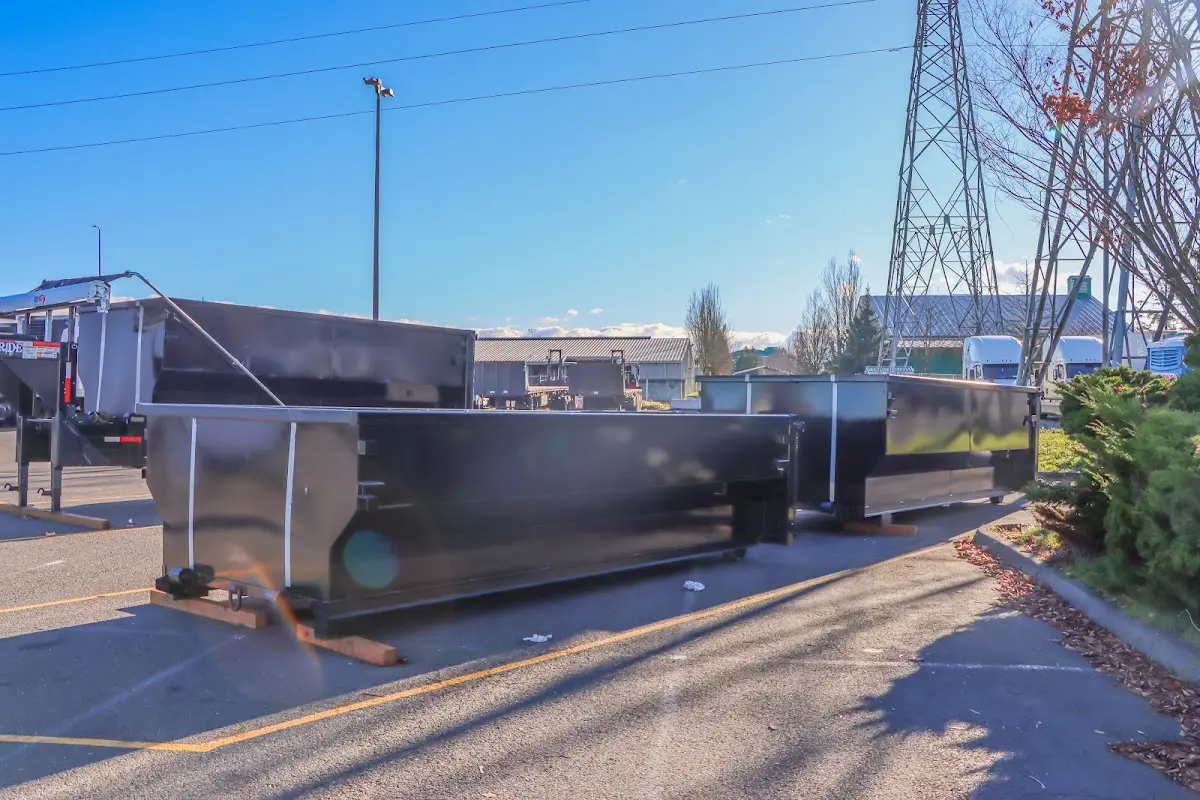 Roll-off dumpster ready for waste disposal at job site for Construction Dumpster Rental in Cinco Ranch